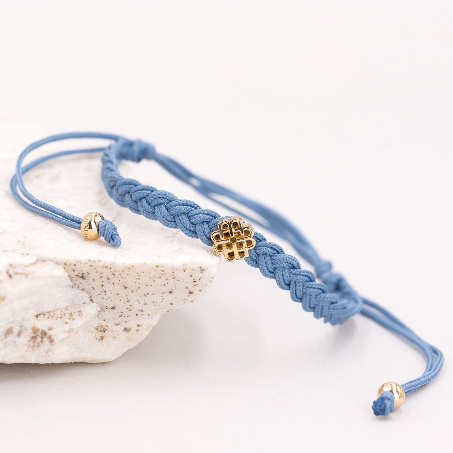PULSERA AZUL DE LA PAZ ORO