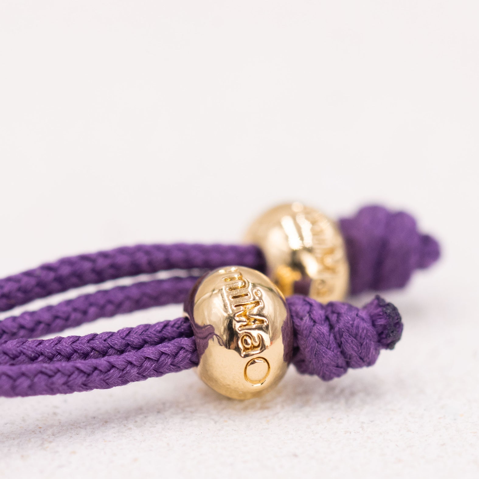PULSERA MORADA DE LA CREATIVIDAD ORO