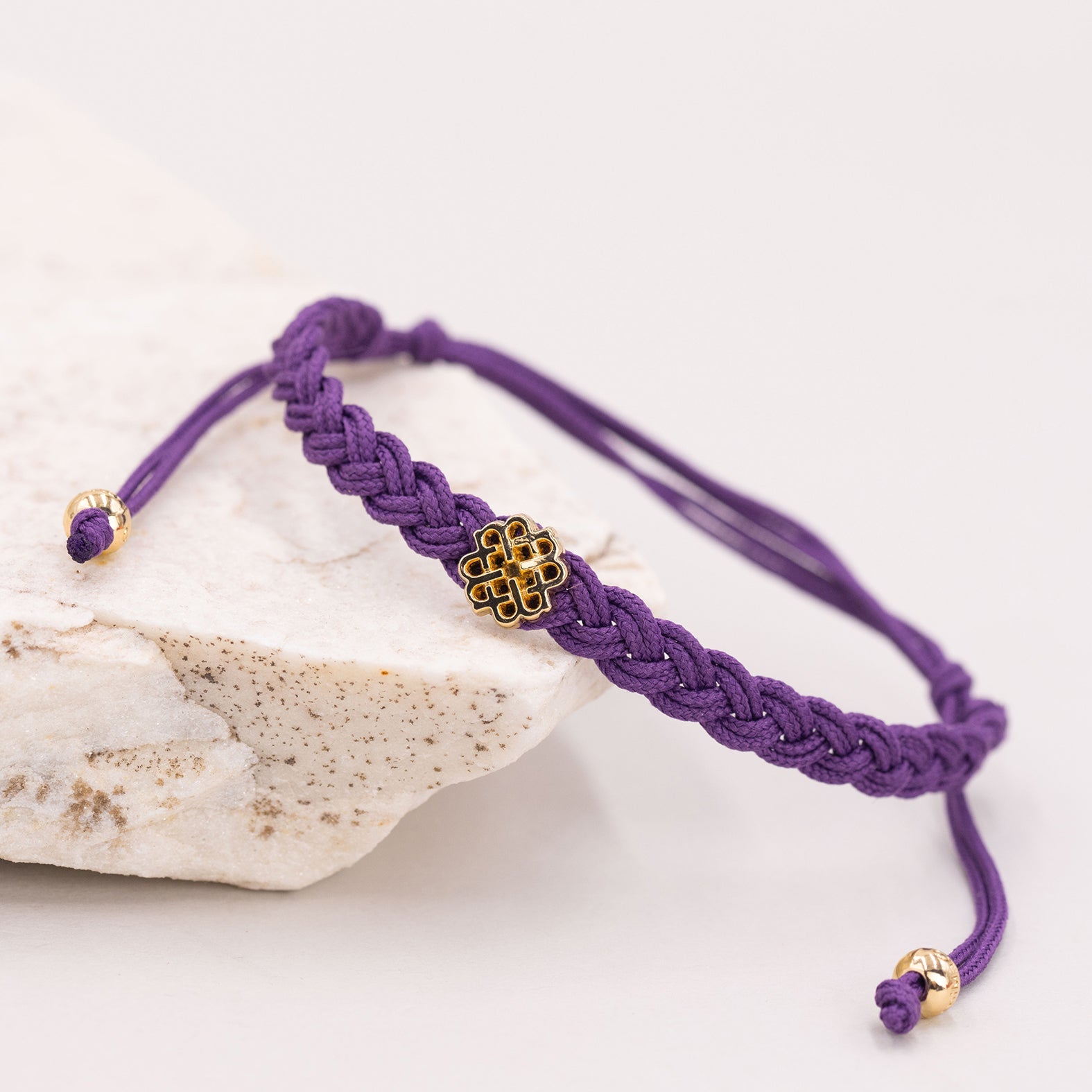 PULSERA MORADA DE LA CREATIVIDAD ORO